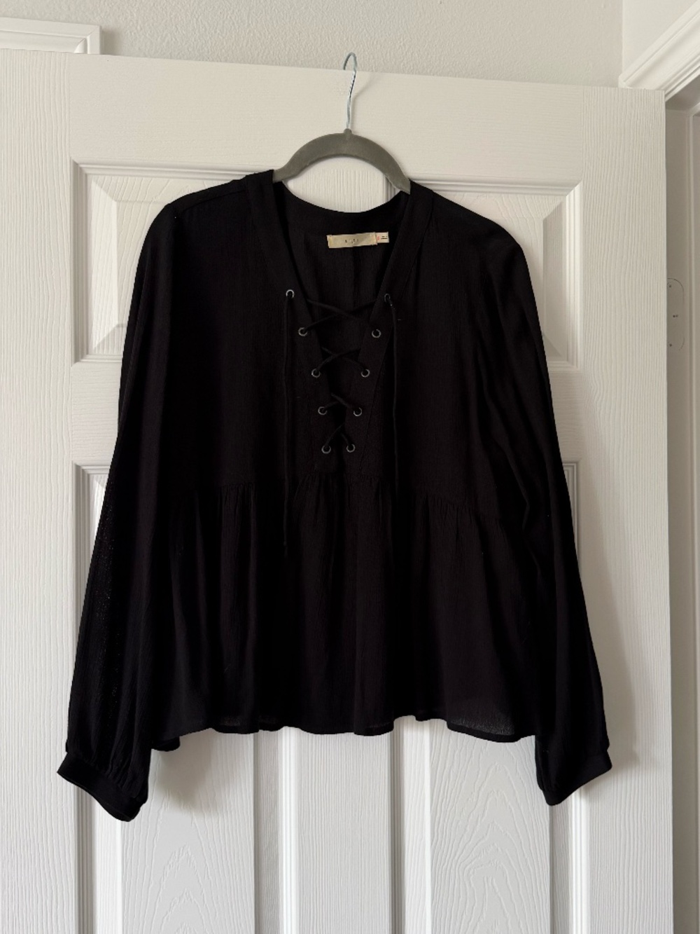 Lush Blouse with Lace-Up Neckline